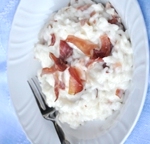 Risotto cremoso con speck, robiola e rosmarino